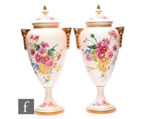 A pair of Royal Worcester limited edition Blush Ivory Golden Bouquet pedestal vases, 2001, inspired by an original design fro
