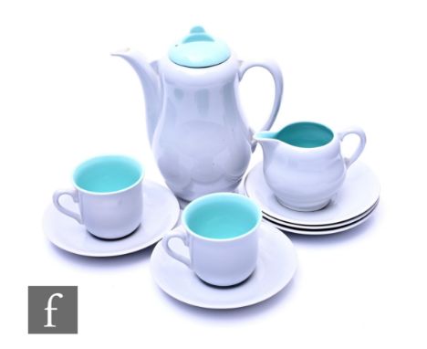 A Clarice Cliff for Royal Staffordshire Ceramics coffee set, comprising a coffee pot, a milk jug, two cups and five saucers a
