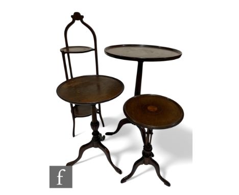An Edwardian mahogany dished top circular tripod occasional table, diameter 49cm, two similar small wine tables and a three t
