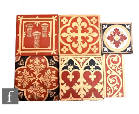 A Minton &amp; Co 6 inch unglazed encaustic terracotta tile, attributed to A.W.N Pugin, circa 1850, quatrefoil fleur de lys i