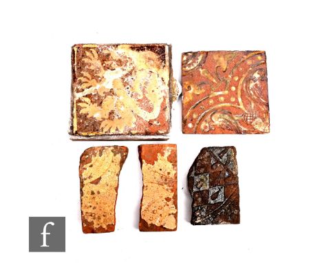 A medieval (attributed) 4 inch brown clay tile, yellow slip on red depicting a rampant lion, reputedly from Langley Abbey, No