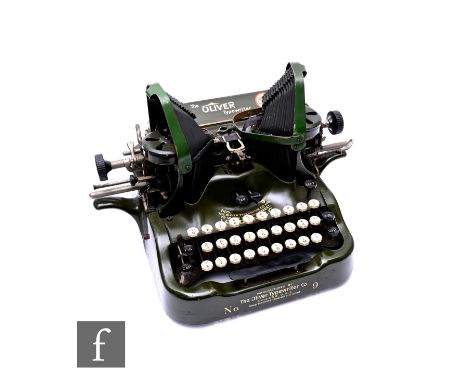 An Oliver No 9 Batwing typewriter finished in green, working keys.