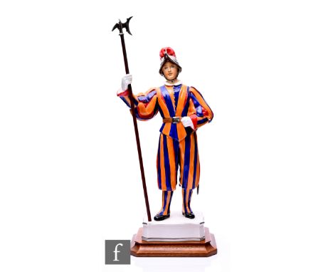 Frederick Gertner for Royal Worcester, 'Trooper of the Papal Swiss Guard', No.111, on wooden plinth, height of figure 32cm.