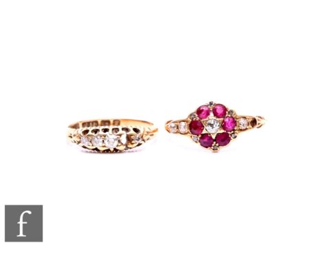 Two 18ct Edwardian stone set rings, to include a ruby and diamond daisy cluster ring, size N, and a diamond set boat shaped r