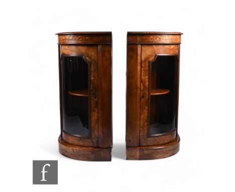 A pair of late 19th Century marquetry inlaid walnut corner cupboards, converted from a credenza, the shelf interior enclosed 