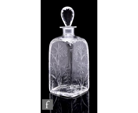 A 20th Century clear crystal glass decanter, of square shouldered form, decorated with intaglio cut stylised floral motifs an