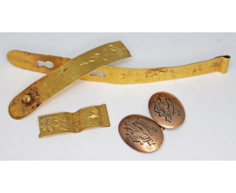 An Egyptian gold bangle (broken) together with a single hallmarked 9ct gold cufflink, gross weight 12.19g.  