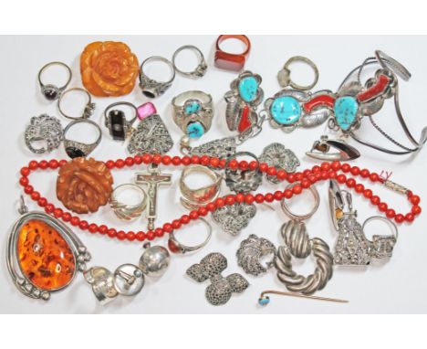 Assorted costume jewellery including a large Polish Art Nouveau style amber cabochon pendant, a single strand of coral beads,