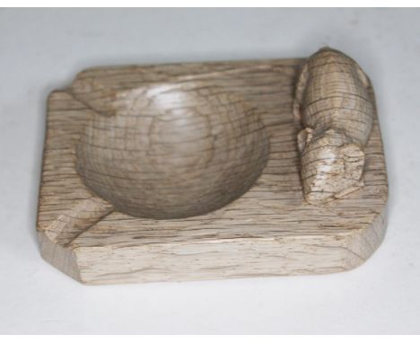 A Robert "Mouseman" Thompson of Kilburn carved oak ashtray, length 10cm.  