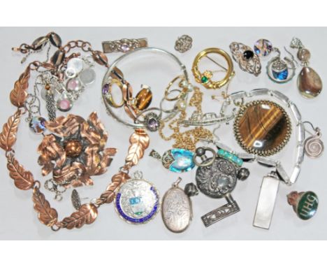 A mixed lot including a hallmarked silver 'West Lancashire District Council' medallion, a hallmarked silver bangle, yellow me