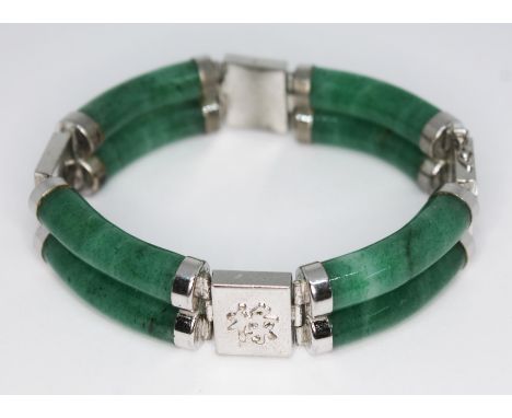 A Chinese aventurine quartz bracelet, length 20cm, marked 'Sterling Silver'.  Condition - good, marks and losses to metal, ot