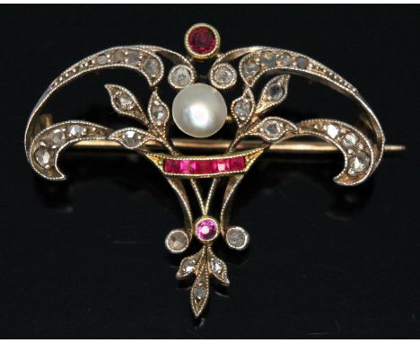An early 20th century diamond, ruby and blister pearl brooch, millegrain and bezel set stones, the central pearl approx. 5mm 