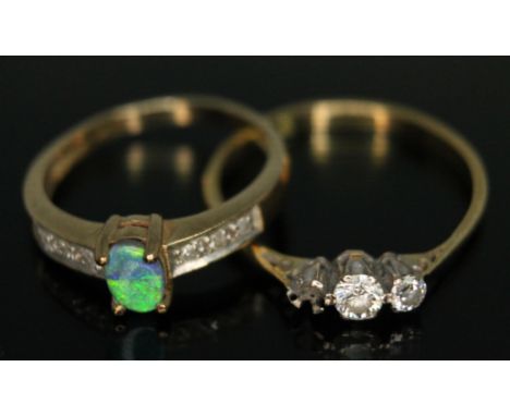 An opal doublet and diamond ring marked '9k' and a diamond ring unmarked, gross weight 4.05g, sizes N &amp; R respectively.  