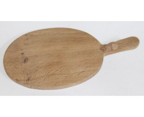 A Robert "Mouseman" Thompson of Kilburn, a carved oak chesse board with mouse signature to handle, length 41cm.  