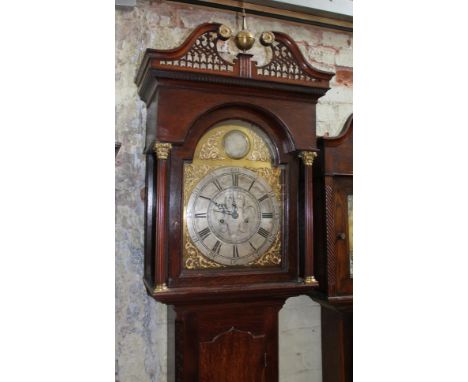 An 18th century eight day oak longcase clock, the 13" brass and silvered dial signed W Tickle N.Castle (William Tickle Newcas