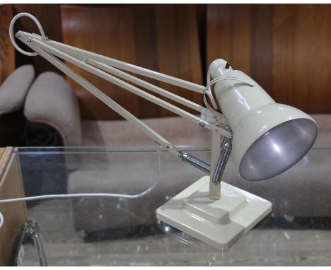 A Herbert Terry &amp; Sons white anglepoise lamp with two step base.  