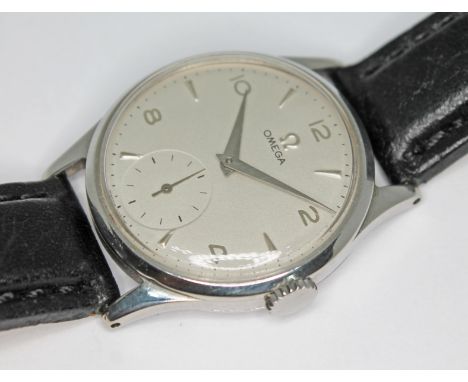 A 1950 Omega 13322 stainless steel wristwatch with signed silvered dial having Arabic numerals, hour markers and dauphine han