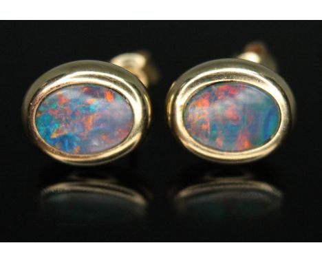 A pair of opal doublet earrings, marked '14K585', length 11mm x 8mm, gross weight 1.62g.  