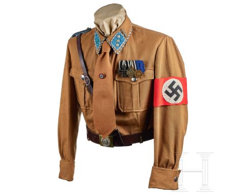 An SA-Sanitätsführer Brownshirt  Light-brown twill cloth, five-button front, two patch pockets with scalloped flaps and pleat