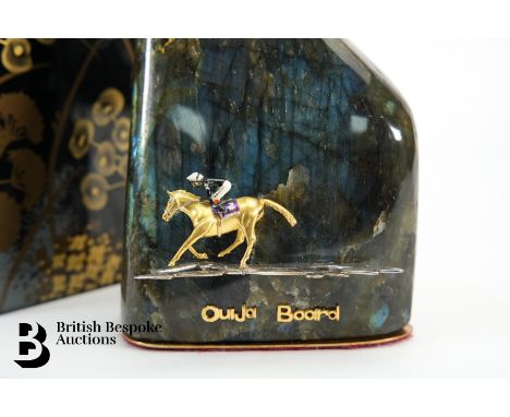 A labradorite presentation piece for British thoroughbred Ouija Board (2001-2022), owned by Edward Stanley, 19th Earl of Derb