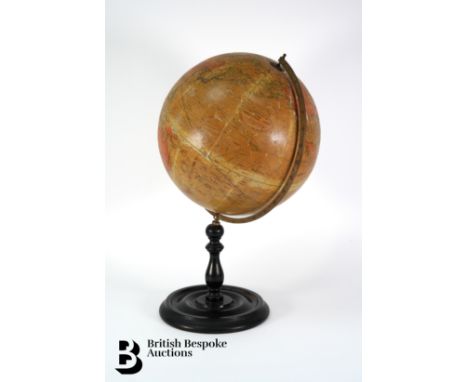 A circa 1920's Geographia 12" Terrestrial globe,&nbsp;showing railways, steamer routes and English possessions, mounted in br