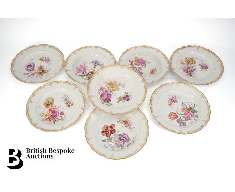 K&oacute;nigliche Porzellan-Manufaktur Berlin, 19th century, each plate painted with sprays of flowers enclosed by a gilt fol