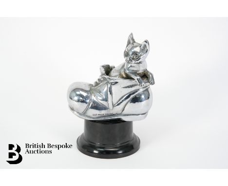 A circa 1928/1929 accessory mascot by Desmo Motor Accessories Limited of England, featuring a cat emerging from a shoe, title