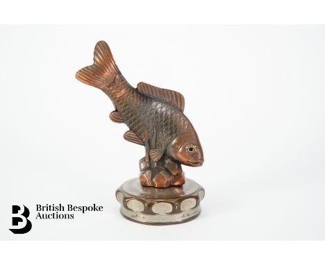An unusual vintage accessory mascot featuring a bronze plated salmon, the mascot retaining the original feature eyes, marked 