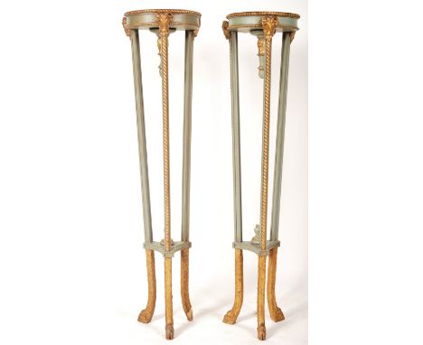 A pair of 19th Century tall torchere bust stands / plant stands / display plinths having circular table tops with gilt painte