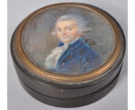 An 18th Century George III portrait snuff box / tobacco pot having an inset portrait on ivory painting depicting a gentleman.