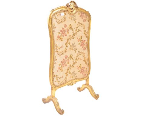 A&nbsp;19th Century Rococo influence gilt gesso wood firescreen having a carved wooden frame detailed with shells raised on s