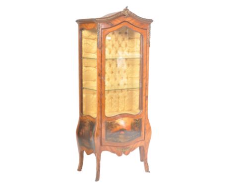 A 20th Century French Louis XIV manner Kingwood painted bombe vitrine display cabinet having an arched pediment top with bras