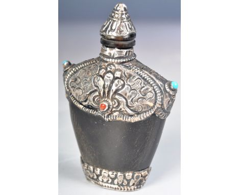 An early 20th Century Chinese / Tibetan silver white metal &amp; rhinoceros rhino horn snuff bottle having a pointed screw th