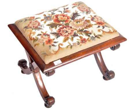 A 19th Century rosewood cross frame stool in the manner of Gillows Of Lancaster having a tapestry inset cushion top with 'X' 