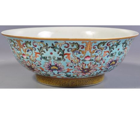 A 20th Century Chinese Republic period Oriental porcelain bowl having a plain glazed interior with intricate Wucai polychrome