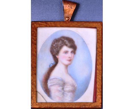 A 19th Century watercolour on ivory portrait painting study depicting a young woman. The sitter facing right with brown hair 