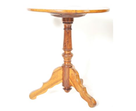 A 19th Century burr oak tripod pedestal wine table / side occasional table having a circular top with quarter panel veneered 