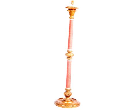 A 19th Century Religious Cathedral / Ecclesiastical gesso wood gilt painted floor standing pricker candlestick having a point