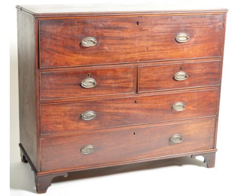 An early 19th Century George III mahogany secretaire chest of drawers. Comprises of a pair of faux drawers having a fold down