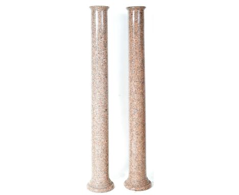 A pair of 19th Century George IV pink granite marble Architectural columns. The columns having circular tops with long centra