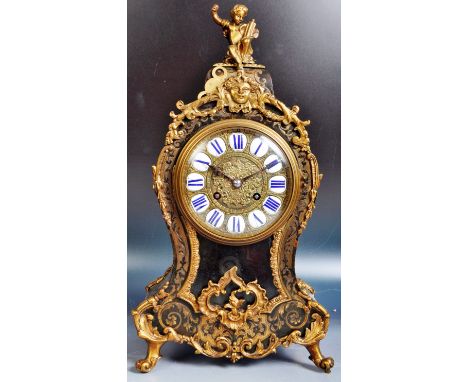 19th Century French Boullework / Boulle Work table mantel bracket clock having intricate brass inlay scroll work. Central gil