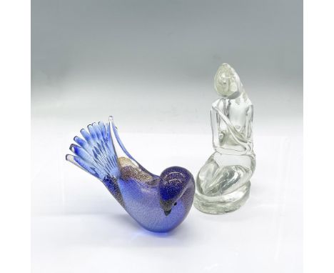 Pair of art glass figurines. A clear glass kneeling woman with crossed arms in the style of Steuben, signed by the artist. A 