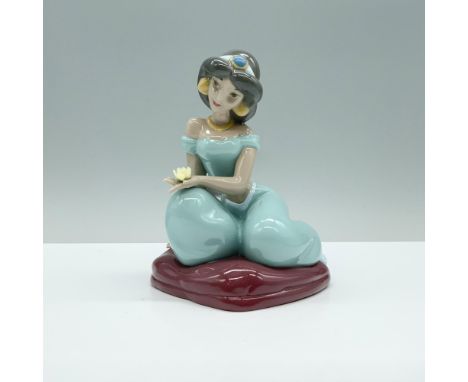 A delicate porcelain figurine of Disneys Jasmine, dressed in her classic outfit, elegantly seated on crossed legs atop a pill