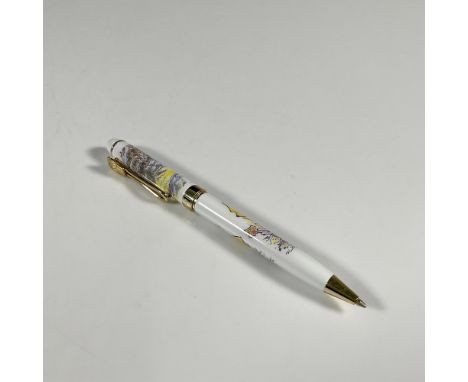 A Disney collector pen decorated with small Winnie the Pooh scenes. Gold-tone parts, the refill is interchangeable between ei