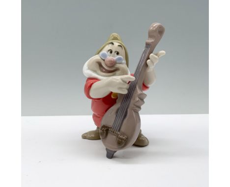 Bring joy to your collection with Doc from Snow White, dressed in his traditional outfit, smiling brightly as he holds a guit