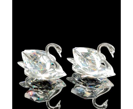 Crystal bodies and wings are faceted to catch the light. Smooth crystal neck and head give the figural an elegant look. Swaro