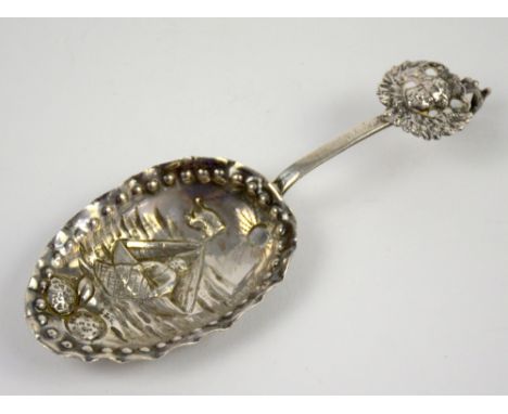 Continental silver caddy spoon with a scene of a fishing boat, import marks for London, 1897,