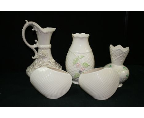 BELLEEK - A collection of 5 pieces of Belleek to include a shamrock pattern vase, a pair of shell vases, a basket weave vase 