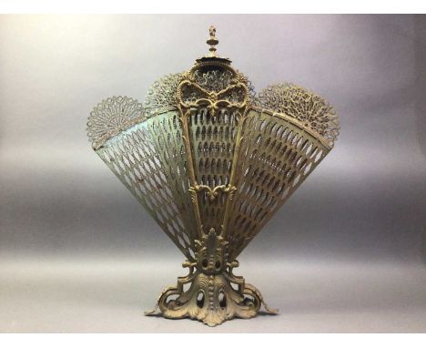 VINTAGE BRASS FIRESCREEN WITH PEACOCK FAN DESIGN with urn finial and cast ananthus leaf decorated base59cm high
