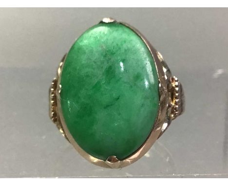 FOURTEEN CARAT GOLD DRESS RING jade set The ring is size J, Stone appears to be a tiny bit loose, appears to be some dents to